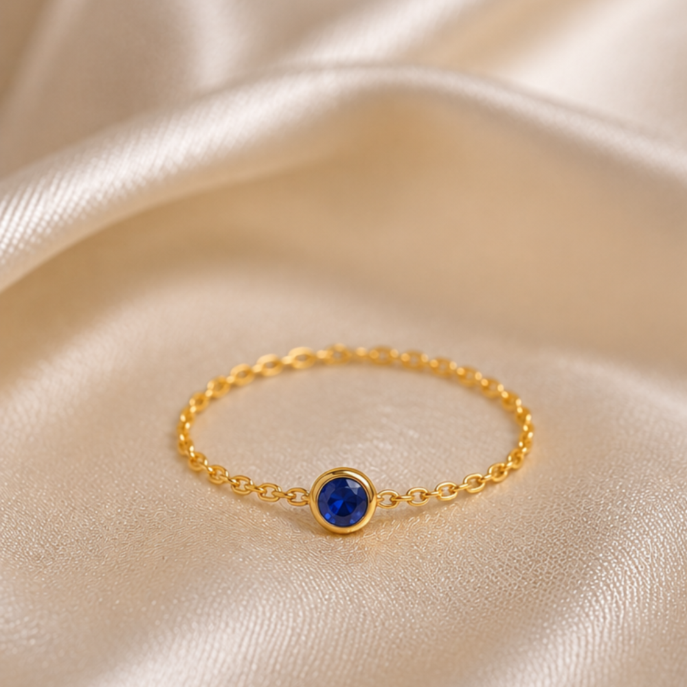 ANEL CORRENTE EM OURO 19,2K C /SAFIRA 0,05CT