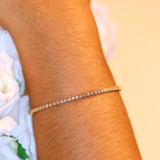 PULSEIRA EM OURO 19,2K C/ ZIRCONIAS