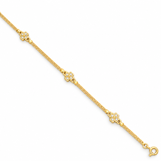 PULSEIRA EM OURO 19,2K C/ ZIRCONIAS ( TREVOS )