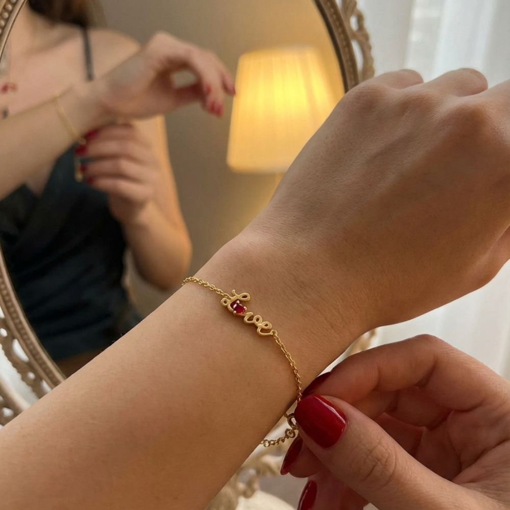 PULSEIRA EM PRATA 925 LOVE COM PEDRA COR RUBI