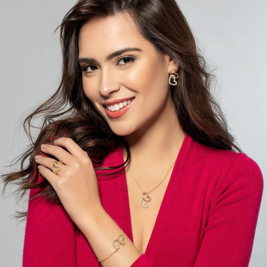 BRINCOS PRATA 925% EUGENIO CAMPOS ( CORAÇÕES ) DOURADA C/ ZIRCONIAS