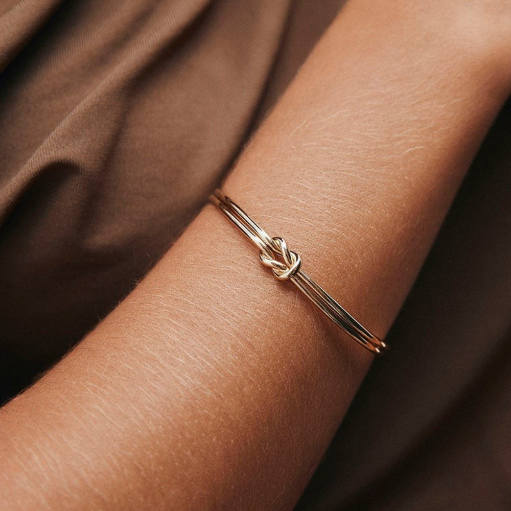 ESCRAVA VIDAL & VIDAL EM BRONZE COM BANHO DE OURO 18K