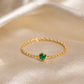 ANEL CORRENTE EM OURO 19,2K C /ESMERALDA 0,05CT