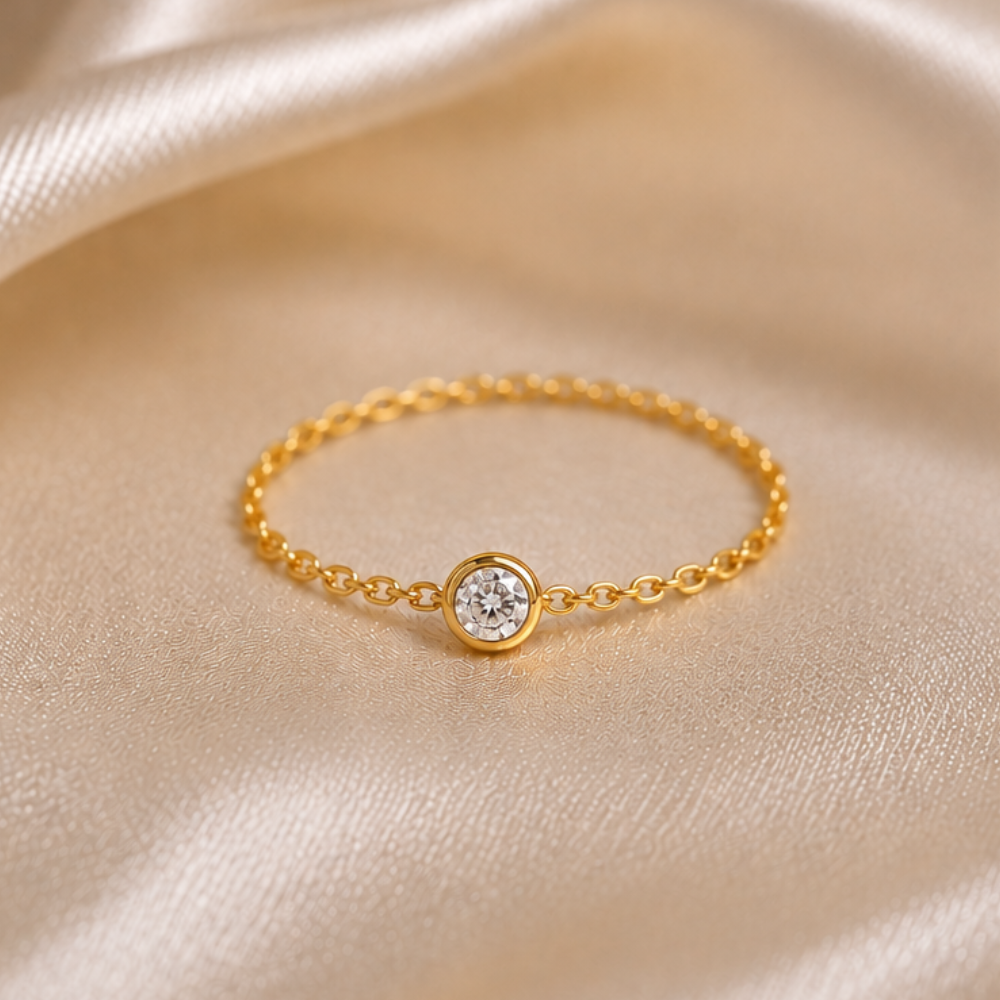ANEL CORRENTE EM OURO 19,2K C /DIAMANTE 0,05CT