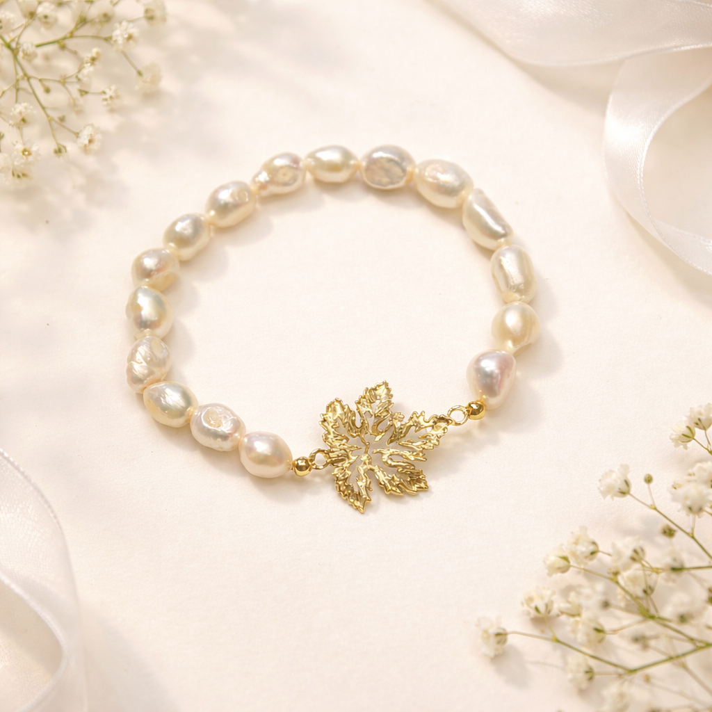 PULSEIRA EM PRATA 925 E PEROLAS DE ÁGUA DOCE COM FOLHA