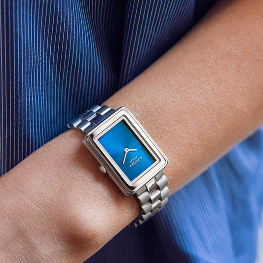 RELÓGIO CAUNY FACETT PRATEADO COM MOSTRADOR AZUL "CFT003"