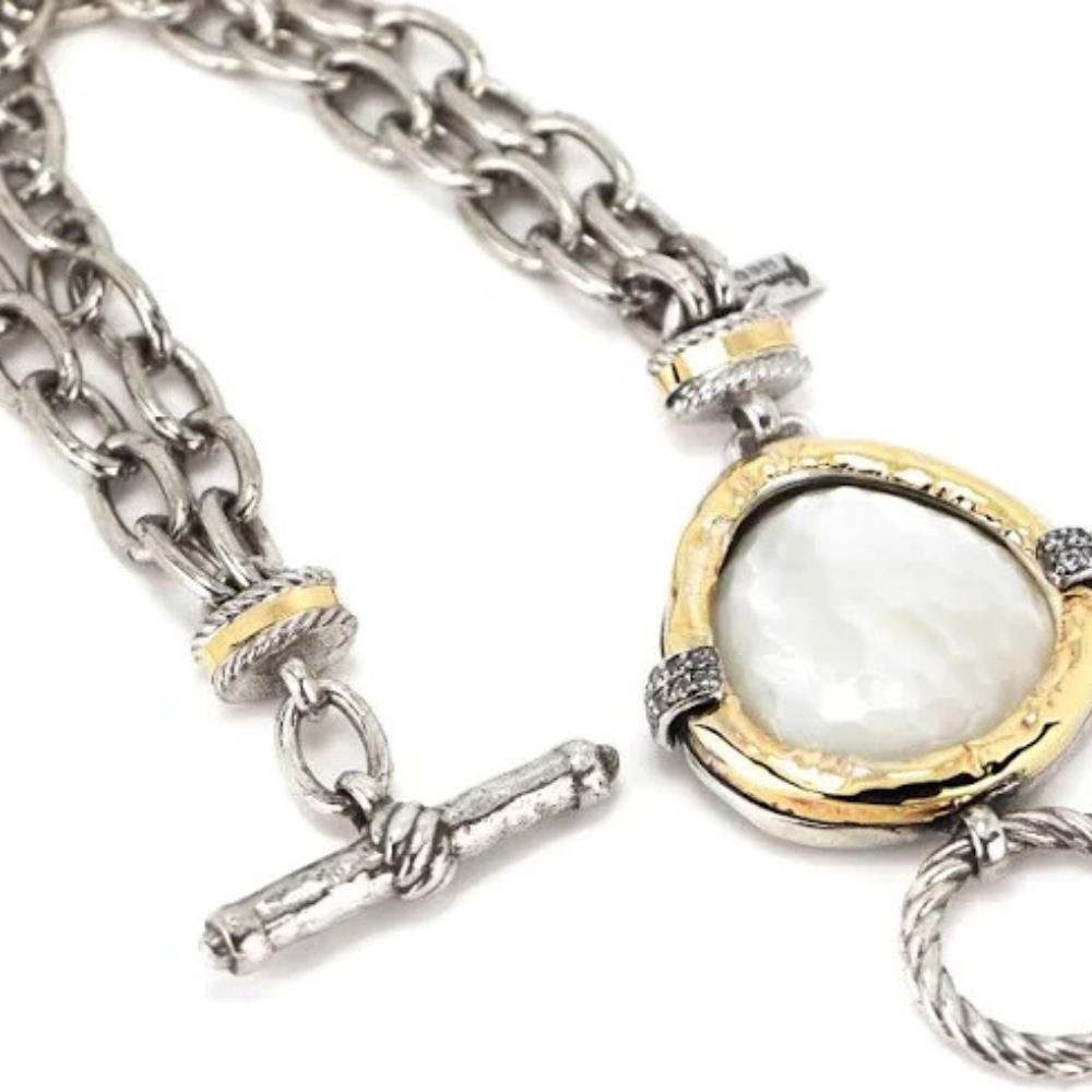 PULSEIRA GUMUS EM PRATA 925% 32,0GR E OURO 375% 1,2GR   C/        ZIRC. E MADREPEROLA