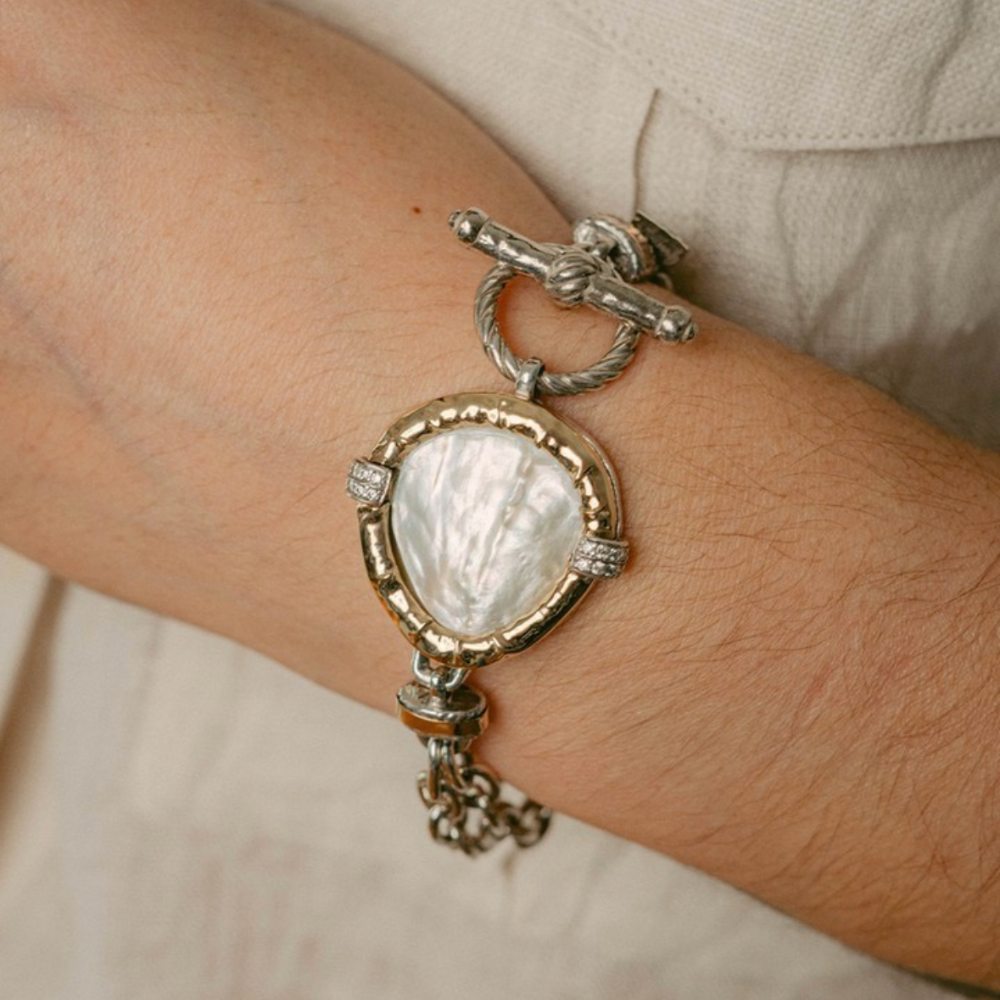 PULSEIRA GUMUS EM PRATA 925% 32,0GR E OURO 375% 1,2GR   C/        ZIRC. E MADREPEROLA