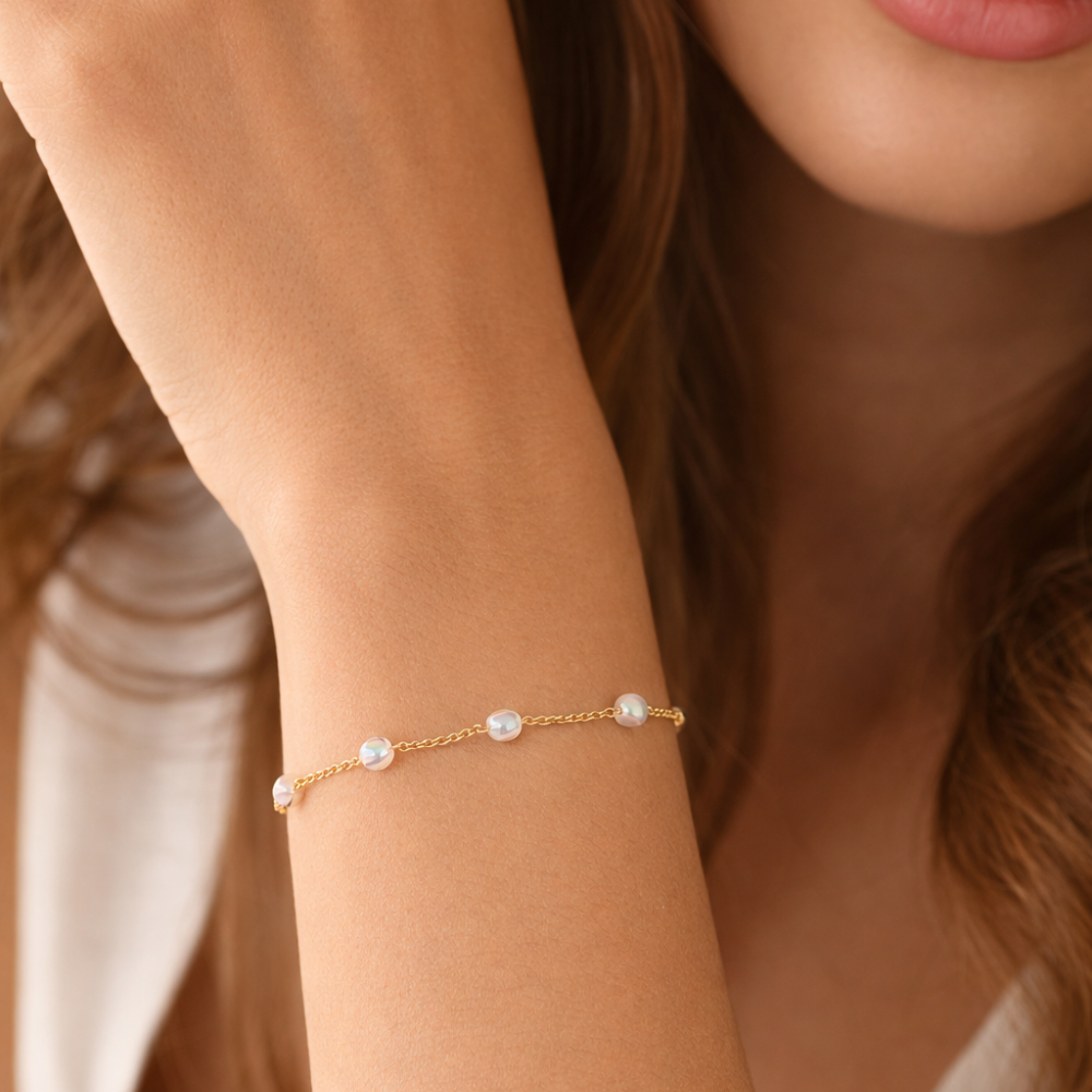 PULSEIRA EM OURO 19,2K PEDRAS CRISTAL