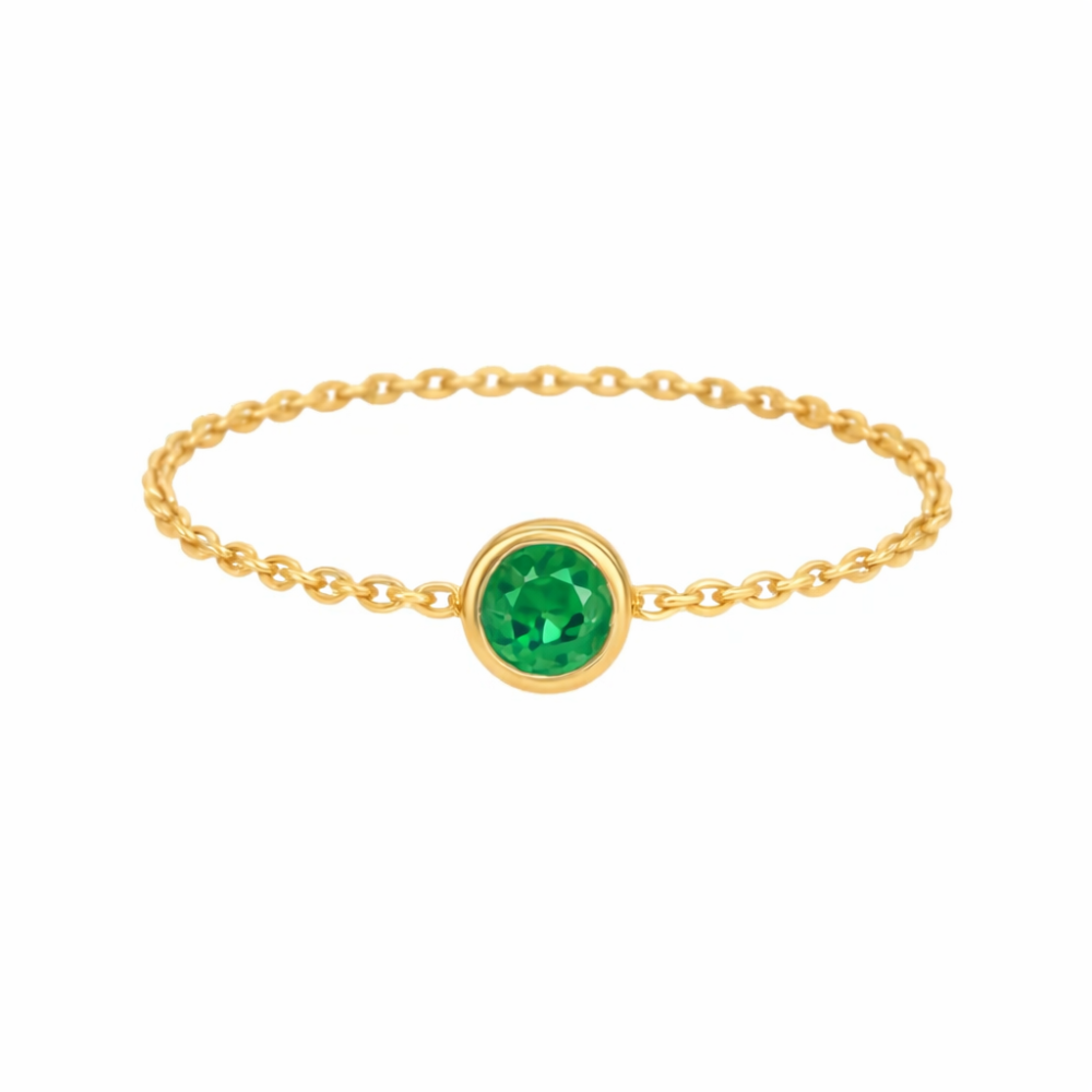 ANEL CORRENTE EM OURO 19,2K C /ESMERALDA 0,05CT