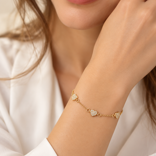 PULSEIRA EM OURO 9K MALHA LOVE C/ CORAÇÕES E ZIRCONIAS