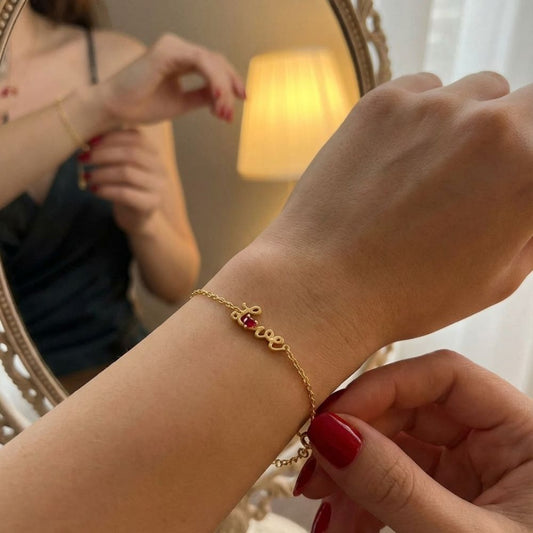 PULSEIRA EM PRATA 925 LOVE COM PEDRA COR RUBI