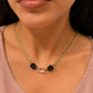 COLAR EM PRATA 925% DOURADA COM PEDRAS PRETAS